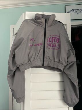 LF Cropped Windbreaker Jacket in Light Gray with Purple Logo